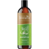 A brown plastic bottle of Biologika Everyday Coconut Shampoo 1L Family Size features a green label with coconut and leaf images. This natural, sulphate-free shampoo is biodegradable, ideal for gentle everyday family care.