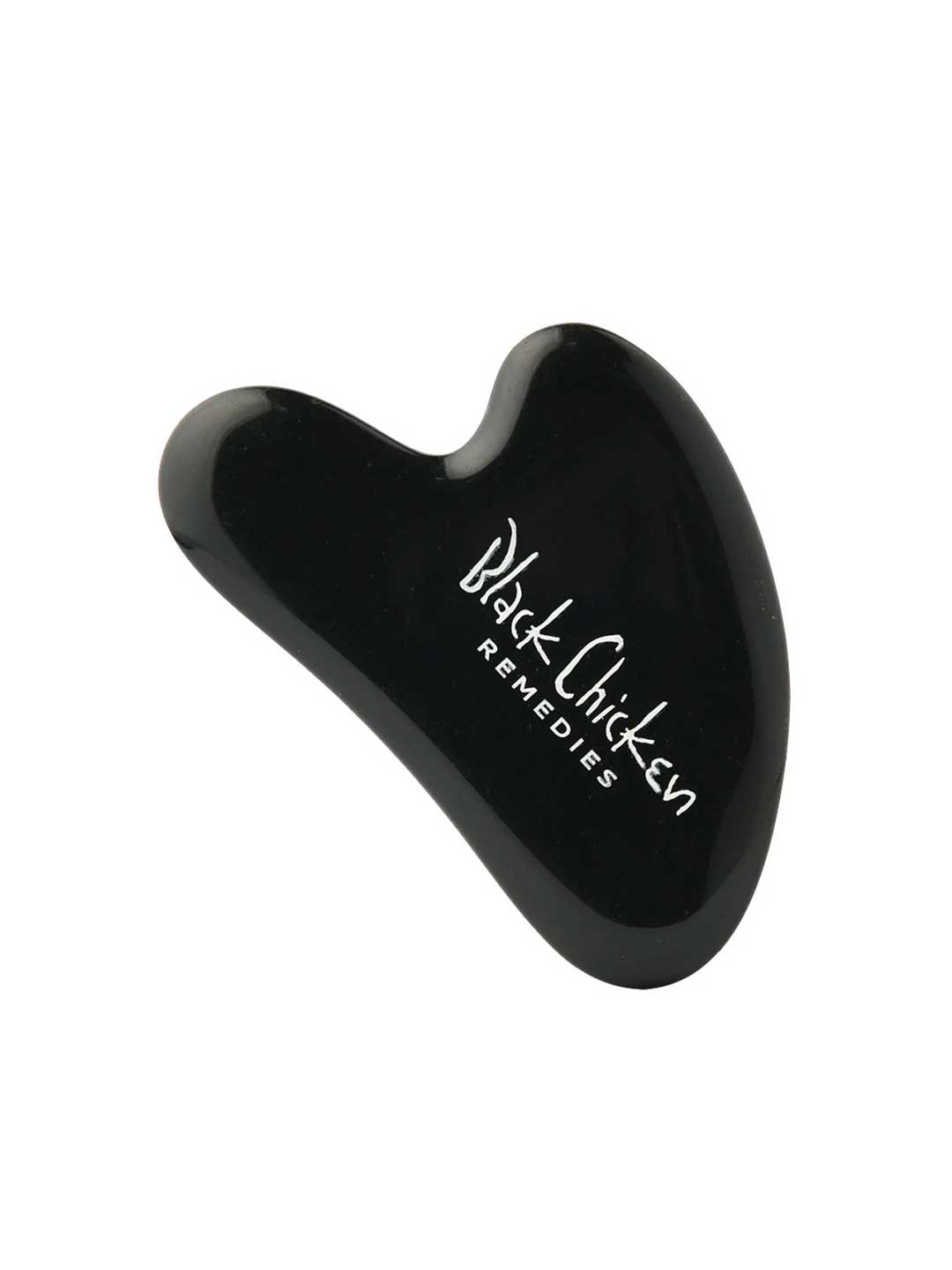 The Black Chicken Remedies Black Obsidian Gua Sha is a sleek black facial massage tool with the brand name in white text, inspired by Traditional Chinese Medicine and shown against a plain white background.