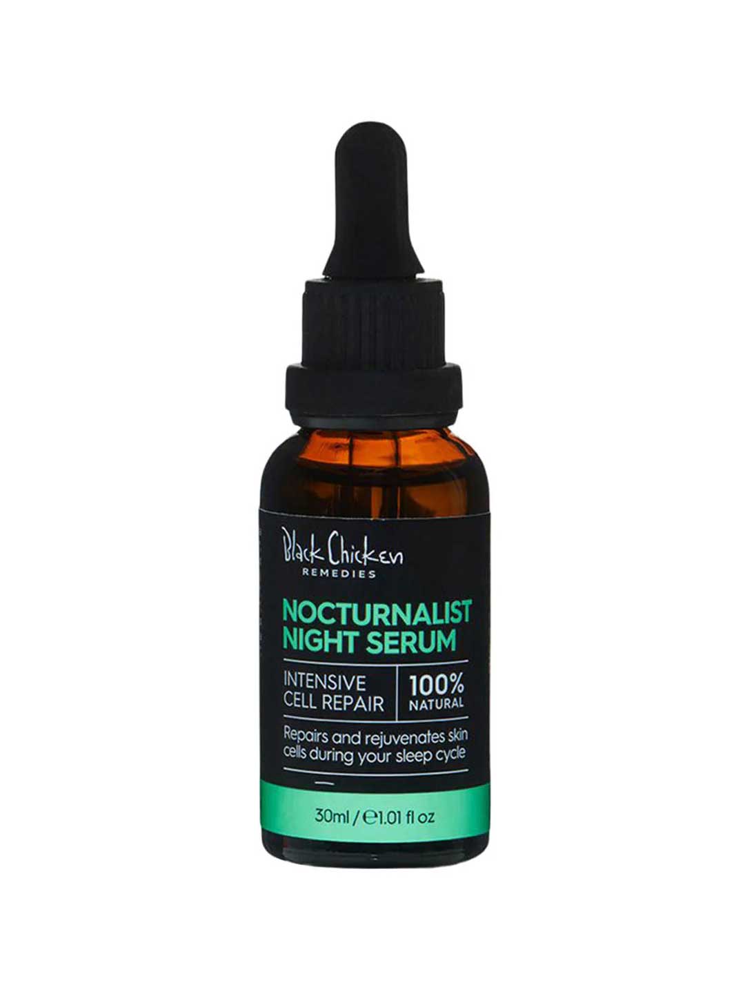 A bottle of Black Chicken Remedies Nocturnalist Night Serum 30ml with a dropper stands before a Jack Daniels bottle, fusing the vibrance of nightlife with luxurious natural skincare.