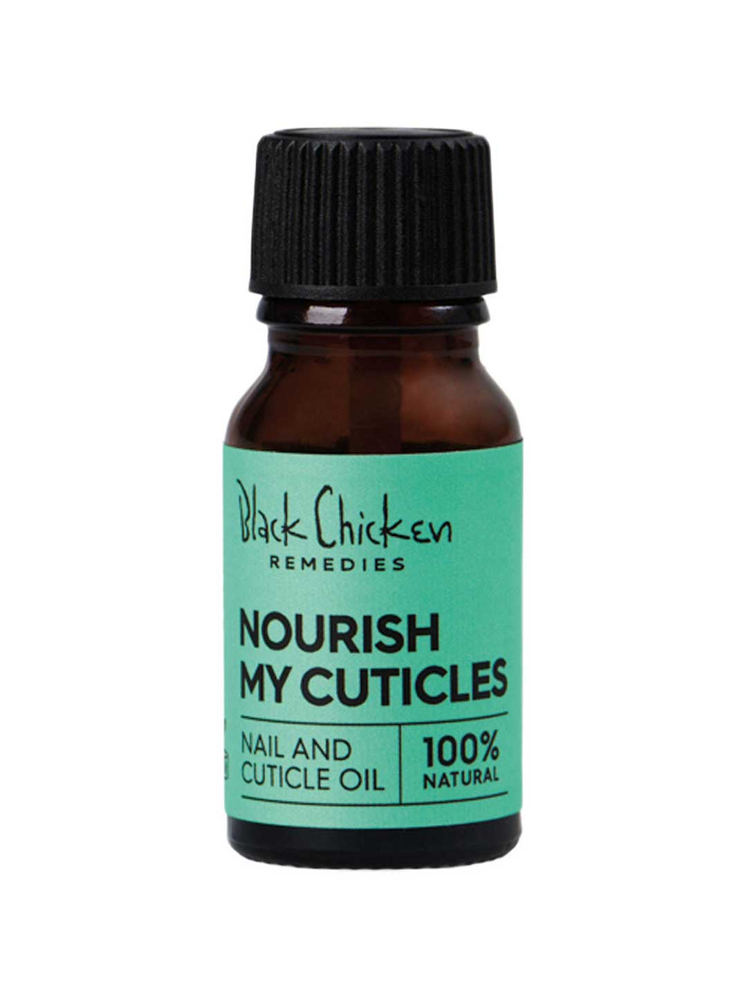 A small brown bottle with a black cap labeled Black Chicken Remedies Nourish My Cuticles Nail & Cuticle Oil 9ml, ideal for nail and cuticle care, rests on a green background.