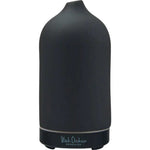 The Black Chicken Remedies Skypipe Essential Oil Diffuser features a sleek, matte black ceramic design with a smooth, rounded top and branding at the base.