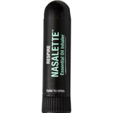 A Black Chicken Remedies Respire Nasalette Natural Essential Oil Inhaler, labeled "TURN TO OPEN" on the bottom cap, stands upright against a white background and features an aromatherapy blend.