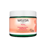 A 150ml jar of Weleda Stretch Mark Body Butter with a green base, white lid, and peach label featuring a pregnant silhouette—this pregnancy-safe moisturizer is designed to help reduce the appearance of stretch marks.