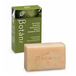 A bar of Botani lemon-scented body and general antiseptic soap in a light peach-beige color, shown in front of its green packaging box on a white background.