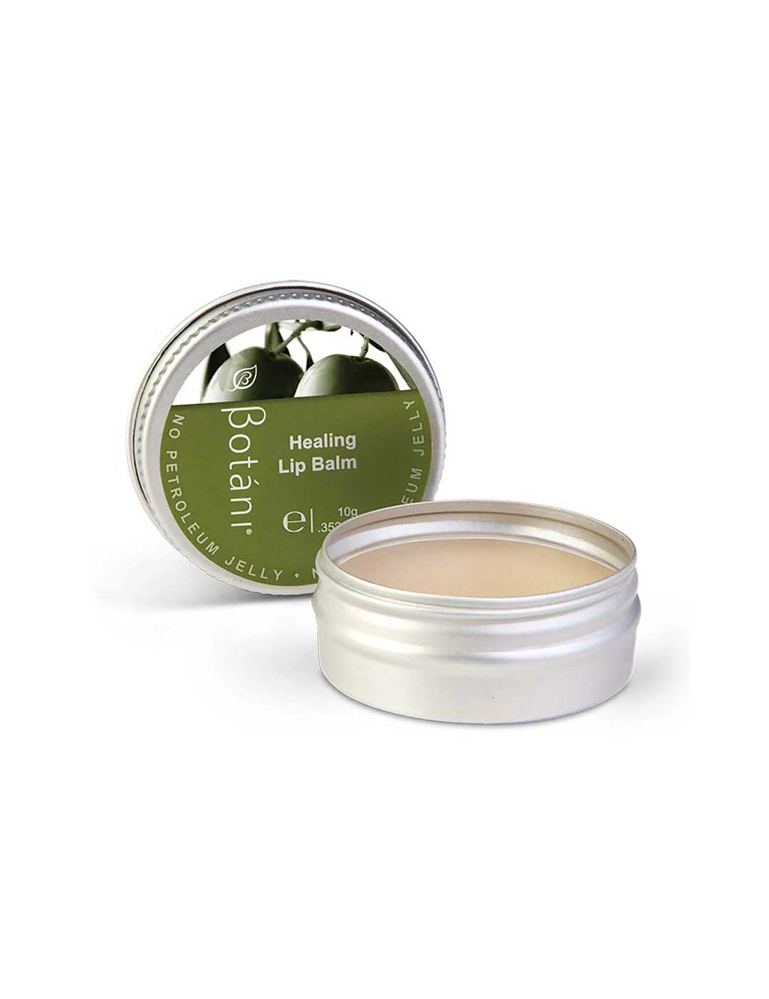 A silver metal tin of Botân Healing Lip Balm, with the lid leaning behind the open tin showing the beige balm inside. The lid features a green label with botanical illustrations.