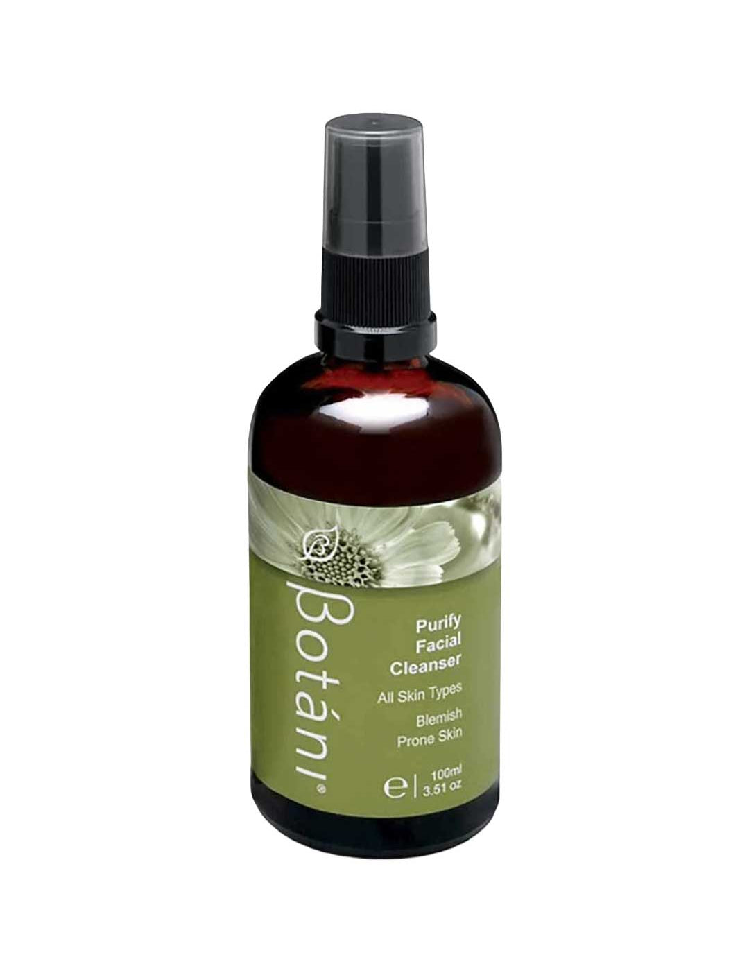 A 100ml amber glass bottle of Botânii Purify Facial Cleanser with a black spray cap and an olive green label, shown on a plain white background.