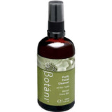 A 100ml amber glass bottle of Botânii Purify Facial Cleanser with a black spray cap and an olive green label, shown on a plain white background.