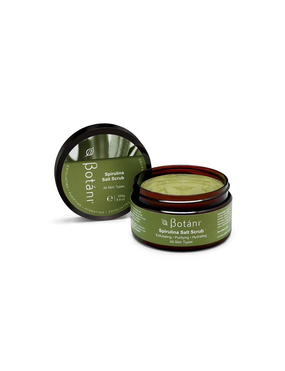 A 250g jar of Botani Spirulina Salt Body Scrub sits open, revealing its green scrub with Australian Sea Salt. Suitable for all skin types.
