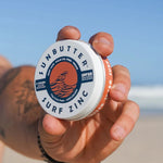 SunButter Vegan Surf Zinc SPF50 held at the beach