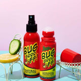 Two red bottles of Bug-Grrr Off 100% Natural Insect Repellent Jungle Strength Spray, with cucumber and lemon slices, sit on small white chairs against a pastel pink and blue background.