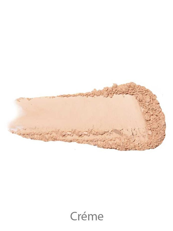 Crème shade swatch of 100% Pure Fruit Pigmented Powder Foundation shown as pressed powder and loose texture.