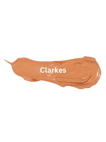 A brown smear of Eco Minerals Mineral BB Cream 32ml with SPF 12 and a natural finish, featuring "Clarkes" written on it, displayed on a white background.