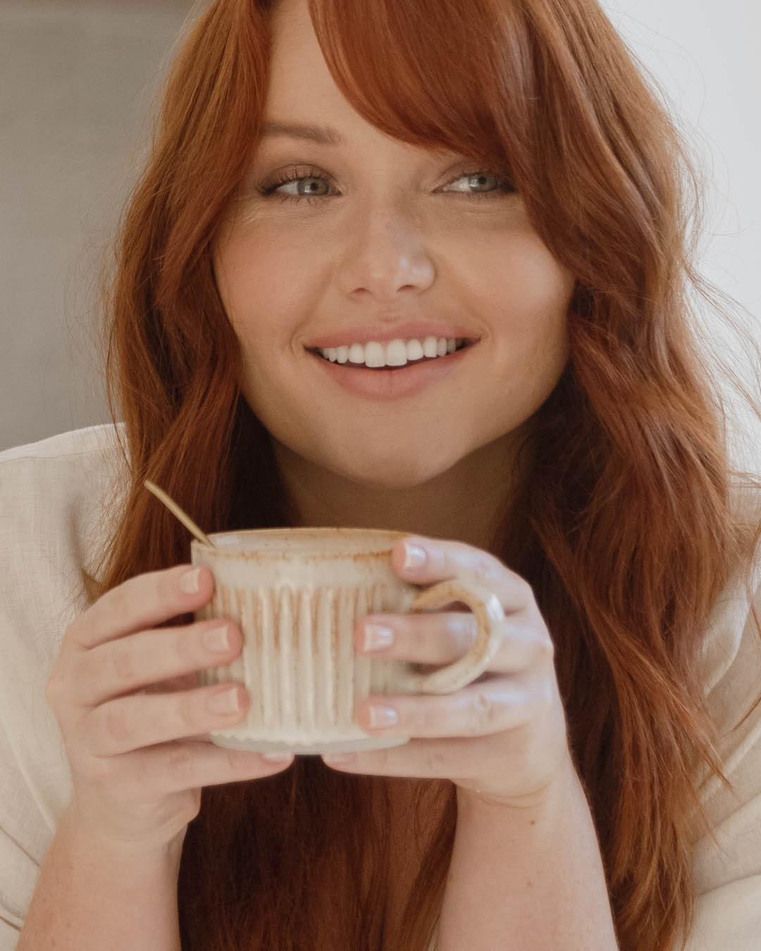Woman enjoying Nutra Naturals Collagen Beauty Caramel