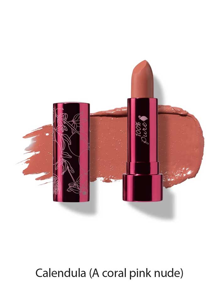 The 100% Pure Pomegranate Oil Moisturising Lipstick 4.5g in Calendula is a coral pink nude shade, shown with its shiny pink tube next to a swatch. Text reads: Calendula (A coral pink nude).