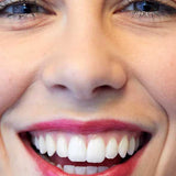 Close-up of a smiling person’s face with white teeth, pink lipstick, and blue eyes. “Cherry Plum” appears in the corner, highlighting Luk Beautifood Lip Nourish Lipsticks 3g for nourishing buildable coverage.