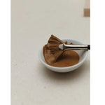 Dr Hauschka Clarifying Clay Mask with fan mask brush