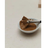Dr Hauschka Clarifying Clay Mask with fan mask brush