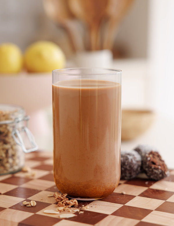 Chocolate protein smoothie made with Nutra Naturals Clean Plant Protein