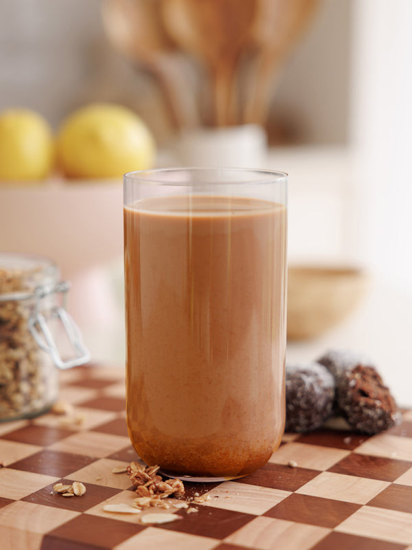 Chocolate protein smoothie made with Nutra Naturals Clean Plant Protein