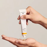 Applying Dr Hauschka Cleansing Cream to the hands