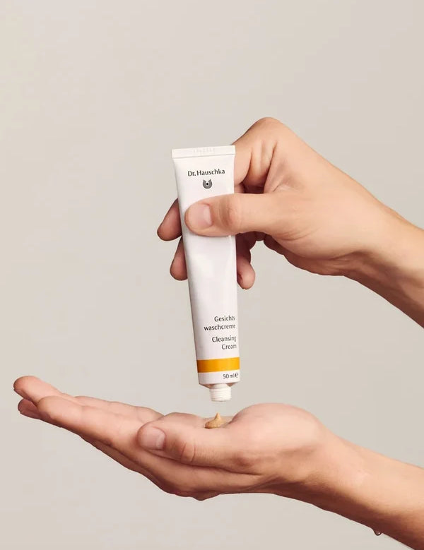 Applying Dr Hauschka Cleansing Cream to the hands