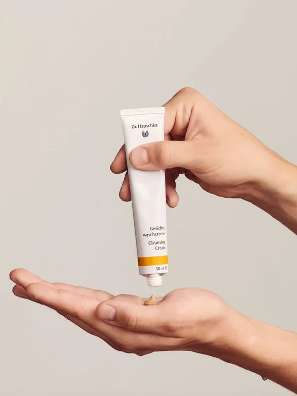 Applying Dr Hauschka Cleansing Cream to the hands