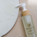 Orgaid Cleansing Oil styled on a bathroom vanity