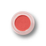 Pink makeup compact on a white background