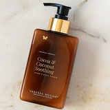 Vanessa Megan Cocoa and Coconut Soothing Hand and Body Cream pump bottle on marble