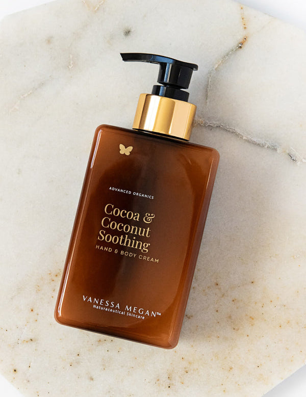 Vanessa Megan Cocoa and Coconut Soothing Hand and Body Cream pump bottle on marble
