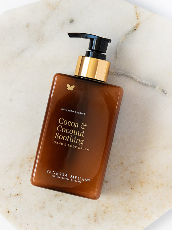 Vanessa Megan Cocoa and Coconut Soothing Hand and Body Cream pump bottle on marble
