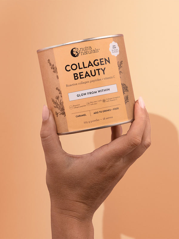 Nutra Naturals Collagen Beauty Caramel 225g held in hand