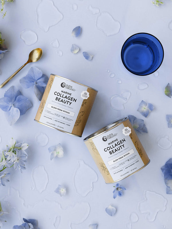 Nutra Naturals Marine Collagen Beauty 225g flatlay with flowers