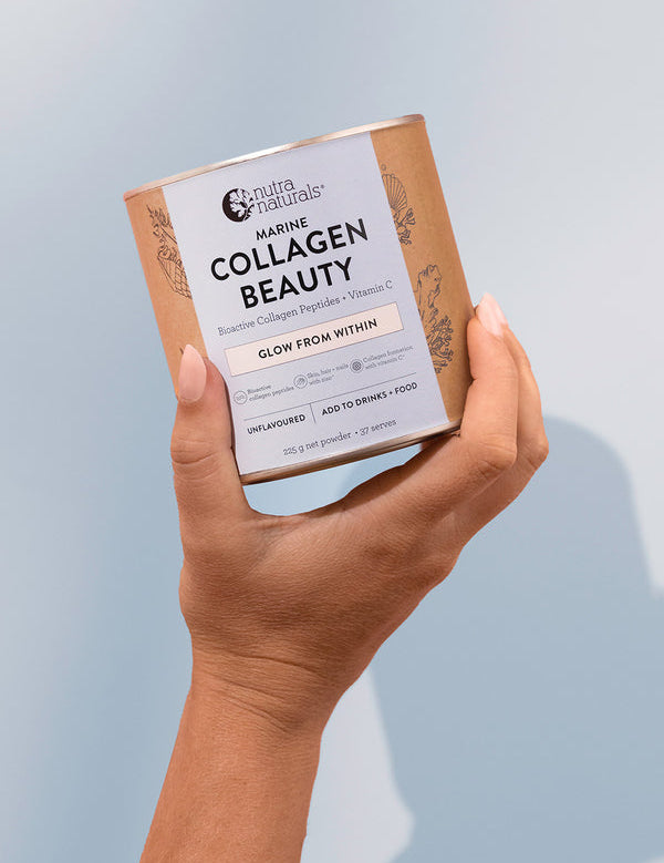 Nutra Naturals Marine Collagen Beauty 225g held in hand