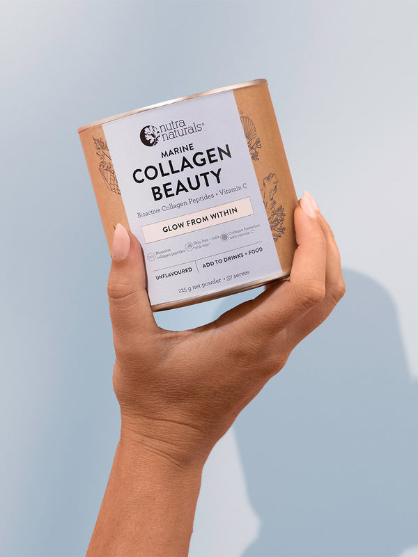 Nutra Naturals Marine Collagen Beauty 225g held in hand