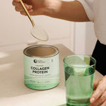 Spooning Nutra Naturals Collagen Protein into a glass