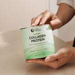 Hands holding Nutra Naturals Collagen Protein 450g