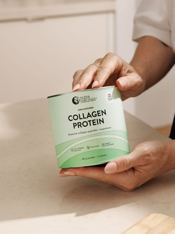Hands holding Nutra Naturals Collagen Protein 450g