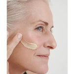 Model applying Dr Hauschka Regenerating Day Cream Intensive