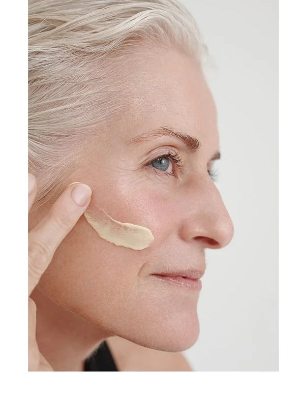 Model applying Dr Hauschka Regenerating Day Cream Intensive