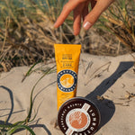 SunButter SPF50 sunscreen on beach