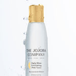 The Jojoba Company Daily Glow Exfoliating PHA Tonic with water splashes