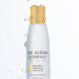 The Jojoba Company Daily Glow Exfoliating PHA Tonic with water splashes