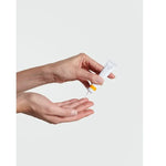 Hands holding Dr Hauschka Daily Hydrating Eye Cream