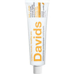Tube of Davids Whitening + Antiplaque Orange + Vanilla Toothpaste on a white background