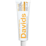Tube of Davids Whitening + Antiplaque Orange + Vanilla Toothpaste on a white background
