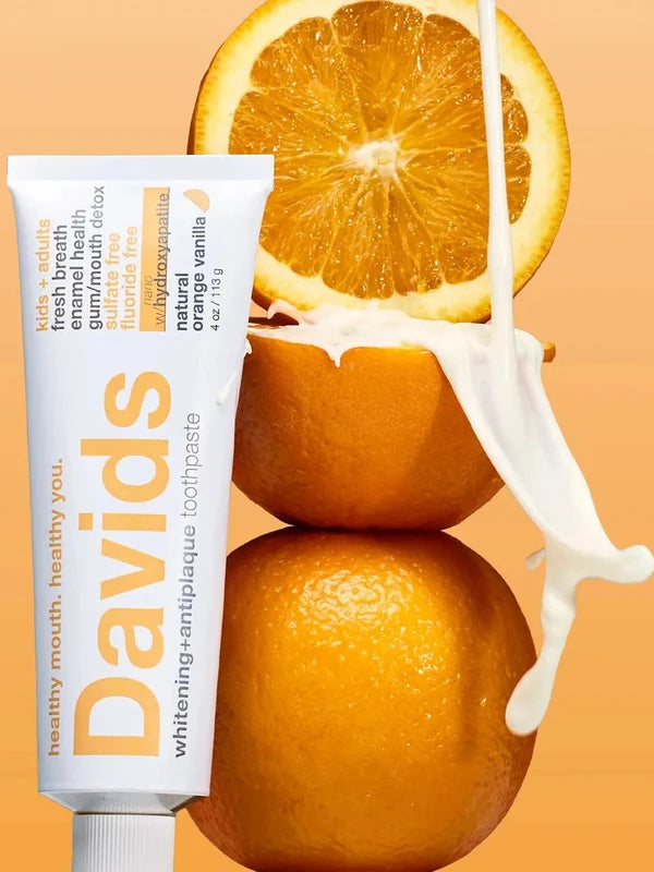 Davids Orange and Vanilla Toothpaste styled with fresh oranges