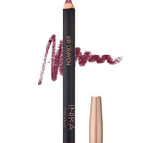 A dark plum organic INIKA Organic Lip Crayons 6.7g with a gold cap is shown beside a plum scribble and the label "Deep Plum." This vegan lip crayon is labeled as INIKA Organic.