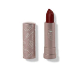 The 100% Pure Cocoa Butter Matte Lipsticks 4.5g is shown in a rosy mauve tube with white floral designs and the cap off, revealing a deep red shade. Text below reads: Desert Rose (a raspberry jam red).