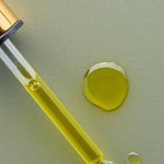 Golden oil and dropper of Antipodes Divine Rosehip and Avocado Face Oil